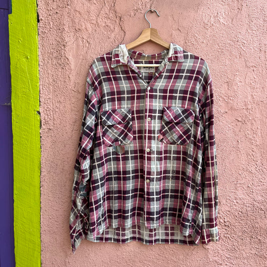 repaired sanforized button up shirt.