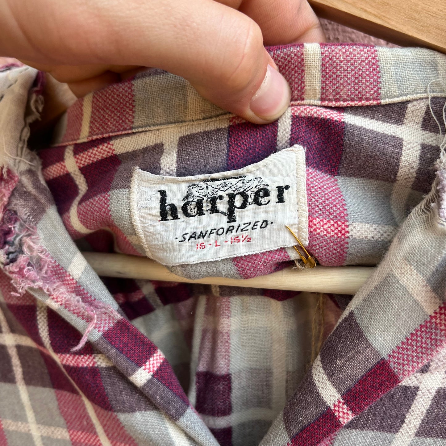 repaired sanforized button up shirt.
