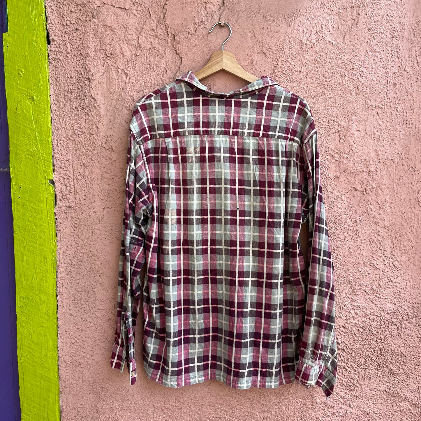 repaired sanforized button up shirt.