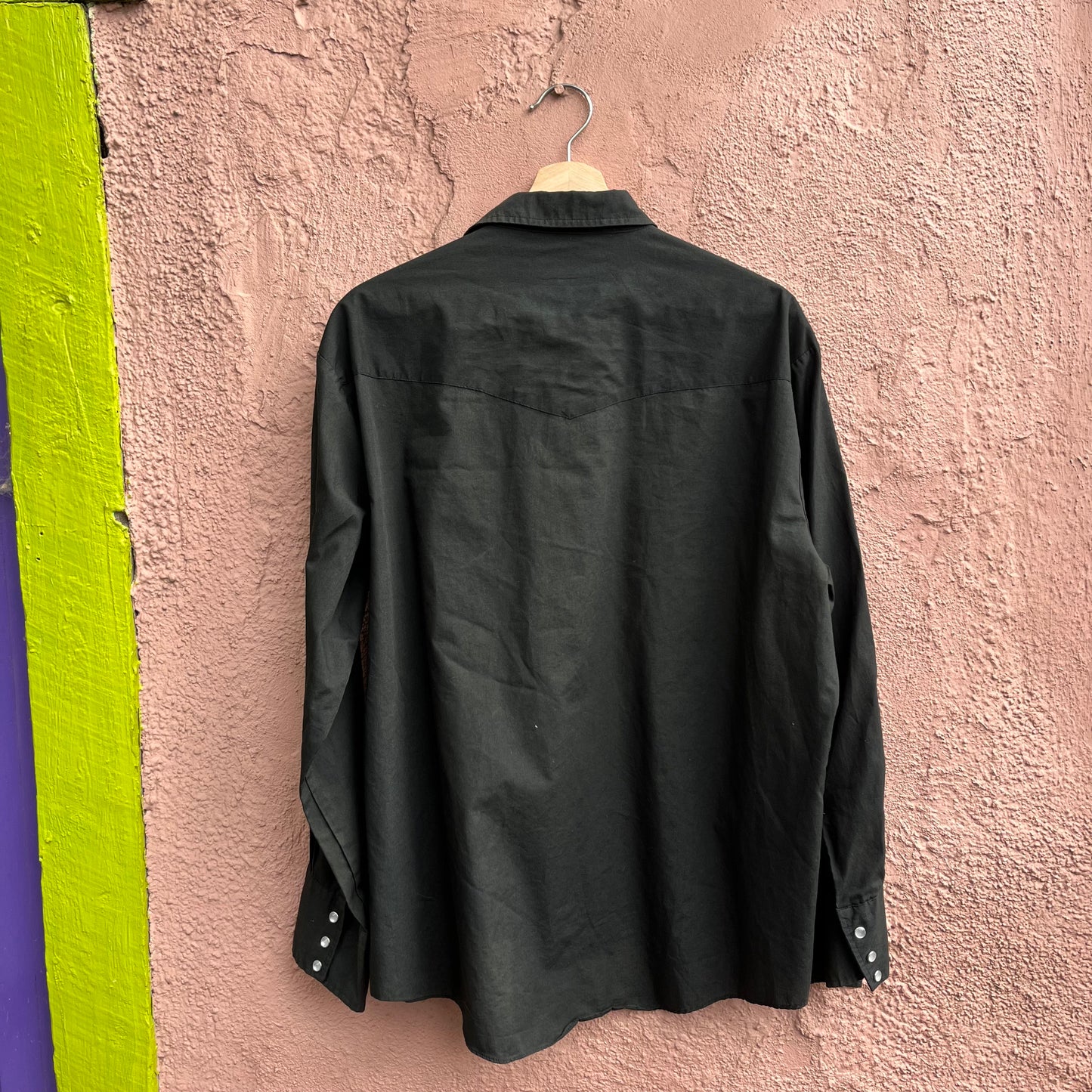 classic pearl snap on black western shirt